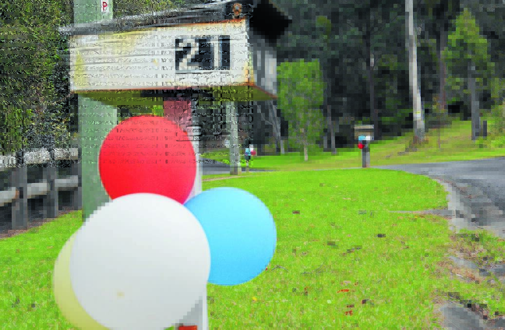 Community spirit: Balloons in Benaroon Drive on Friday when William Tyrrell turned four.