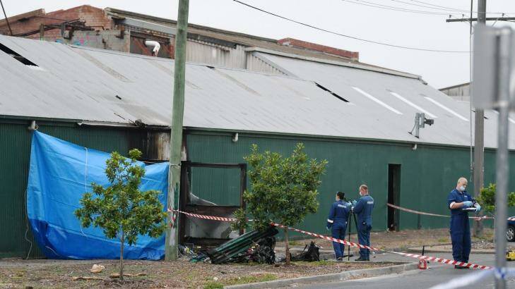 Police and forensic officers at the scene in Footscray Photo: Justin McManus