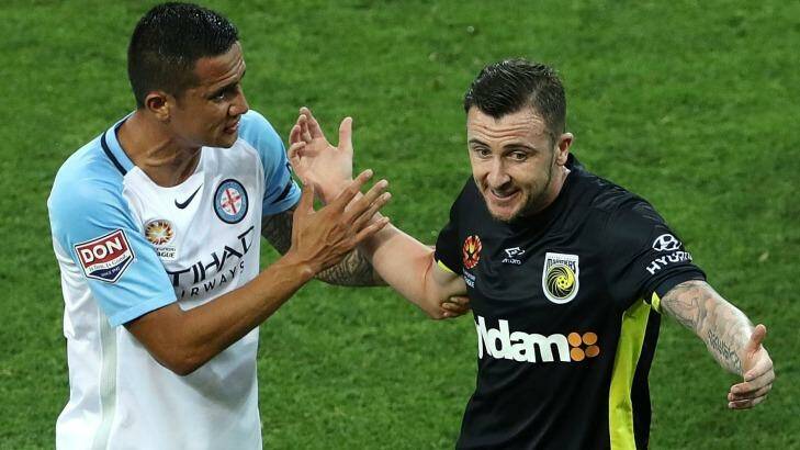 Protagonists: Roy O'Donavan reacts to Tim Cahill after he was sent off. Photo: Robert Cianflone