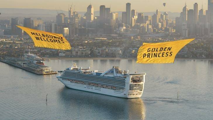Banner-wielding helicopters welcome the Golden Princess to Melbourne. Photo: James Morgan
