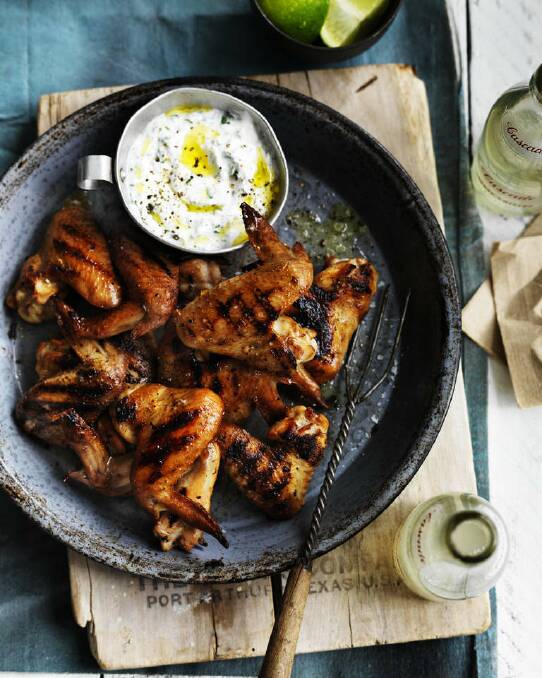 Neil Perry's southern-style smoky chicken wings <a href="http://www.goodfood.com.au/good-food/cook/recipe/southernstyle-smoky-chicken-wings-with-goats-curd-dressing-20150302-3r8xg.html"><b>(RECIPE HERE).</b></a> Photo: William Meppem
