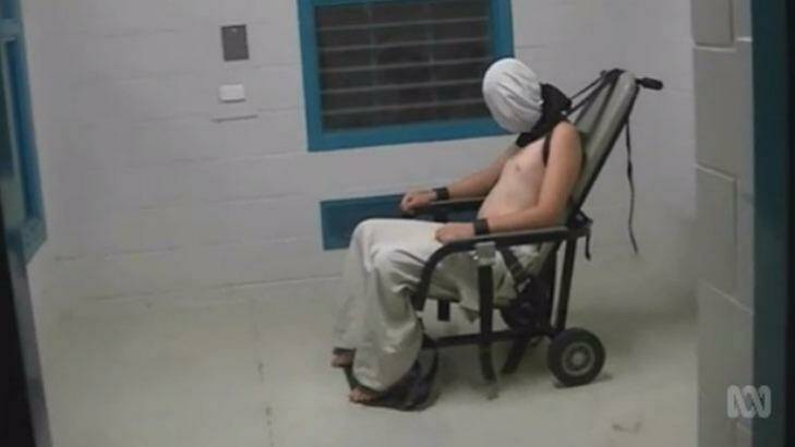An image from the Four Corners program showing the teenage boy strapped to the mechanical chair in the Alice Springs prison. Photo: Four Corners, ABC