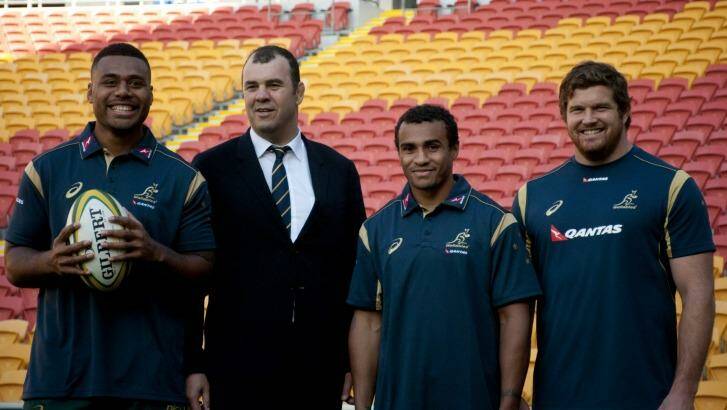 Teaming up: (From left) Samu Kerevi, coach Michael Cheika, Will Genia and Greg Holmes during the Australian Wallabies squad announcement in Brisbane on Thursday. Photo: Robert Shakespeare