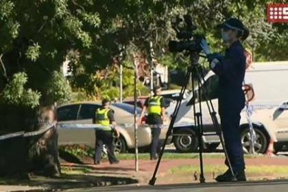 Police at the scene of the discovery of man's body in Dandenong. Photo: Channel Nine