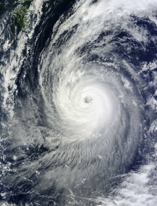 A NASA satellite image shows Typhoon Phanfone in the western Pacific Ocean.  Photo: NASA