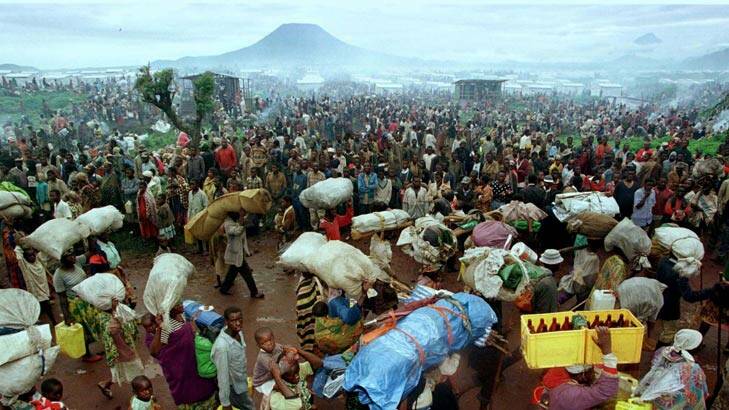 Rwandan refugees arrive in a transit camp in late 1996. Hundreds of thousands of refugees who fled to Zaire after the massacre were making their way back to their home.