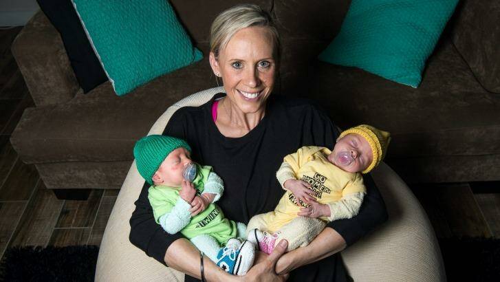 Green and gold: Renae Ingles with twins Milla and Jacob. Photo: Justin McManus