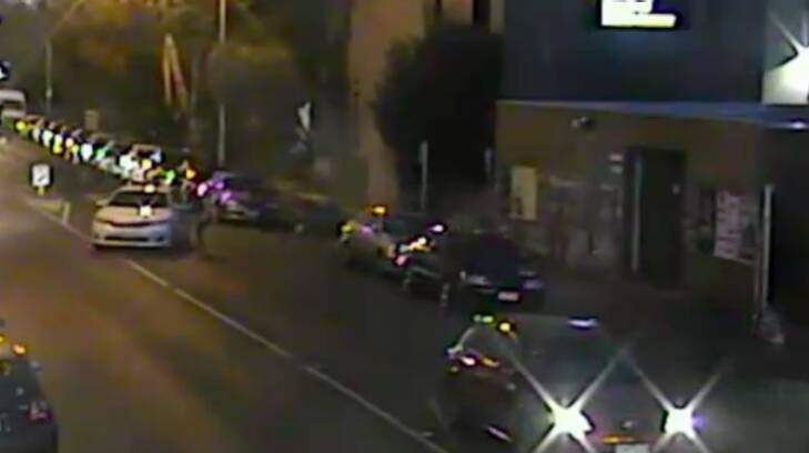 Still taken from CCTV showing the Toyota Camry being driven erratically down Sydney Road, Brunswick. Photo: Victoria Police
