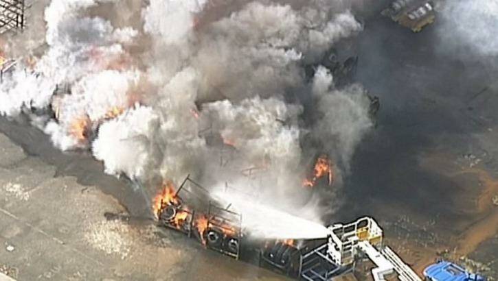Firefighters at the scene of a tyre fire at Dandenong South. Photo: Seven News