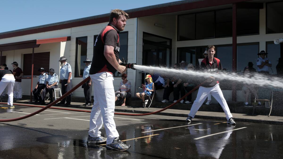 Tom Woodhans and Matt Wills from Warrnambool show their prowess in the hose, hydrant and pumper drill four event at the Western District Fire Brigades Association competition.