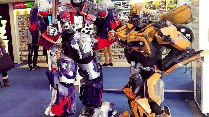Wesley Newell, right, dressed as Transformer character Bumblebee. Photo: Supplied