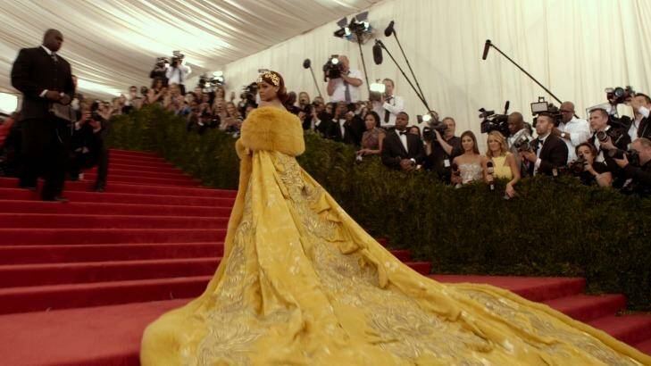 Rihanna wore a magnificent caped dress by Chinese designer Guo Pei at the Met Gala. Photo: Madman