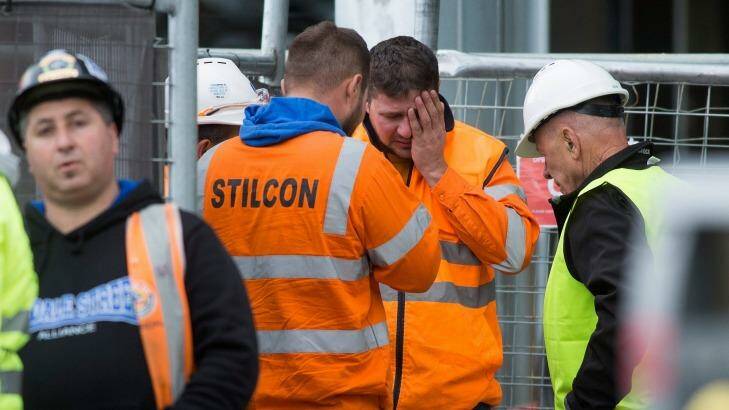 Workers at the South Wharf site on Wednesday. Photo: Paul Jeffers