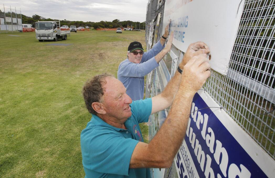 Rotary Club of Warrnambool East members Ralph Ludeman (front) and Terry Baker set up in preparation for the hole-in-one competition which begins Boxing Day adjacent to Viaduct Road, Warrnambool.  Picture: ANGELA MILNE