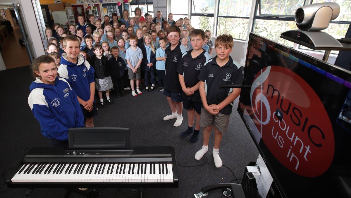 Children from Nullawarre and Panmure primary schools yesterday celebrated the national advocacy day for music education, led by (front, from left) Maddison Lillico and Oscar Baxter, Sam Loveday, Lachlan Walsh and Jack Oates. Picture: DAMIAN WHITE