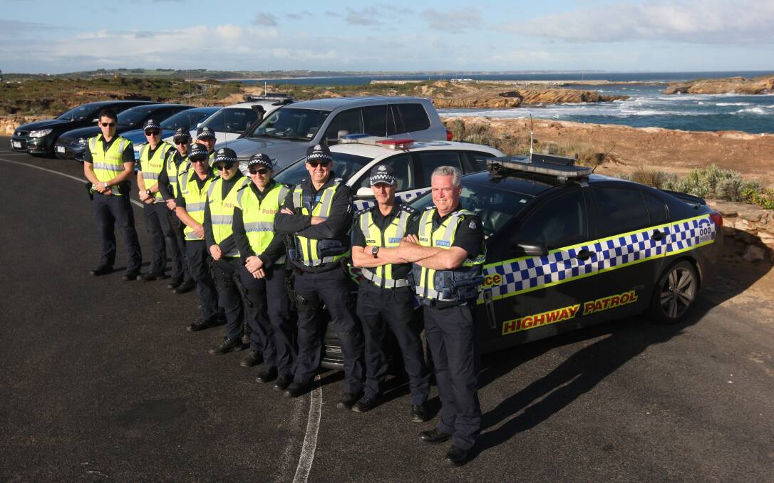 Senior Sergeant Shane Keogh (front right) and Acting Inspector Steve Thompson (second from right) with members from the eight units of police special highway patrol targeting traffic offenders in the south-west this weekend.  Picture: AARON SAWALL