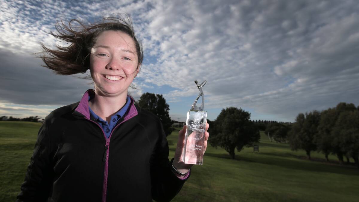Joanna Flaherty, 19, with her second Warrnambool Junior Open Championships trophy. 140708RG18 Picture: ROB GUNSTONE