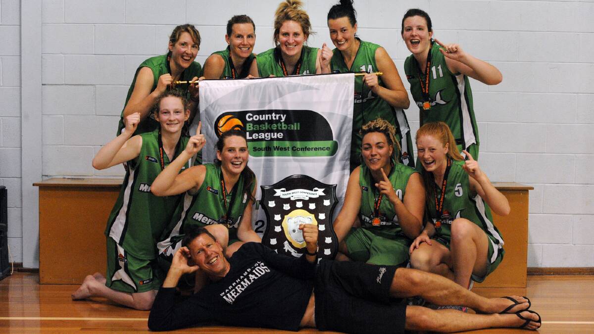 Winners are grinners: The Mermaids celebrate victory in the Country Basketball League south-west conference grand final. Picture: PAUL CARRACHER.