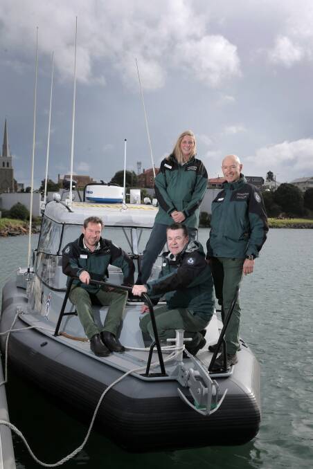 Fisheries officers Cameron McCallum (left), Paul Millar, Amelia Grant and Charlie Cooper on board the new patrol boat, “Doris”. 
