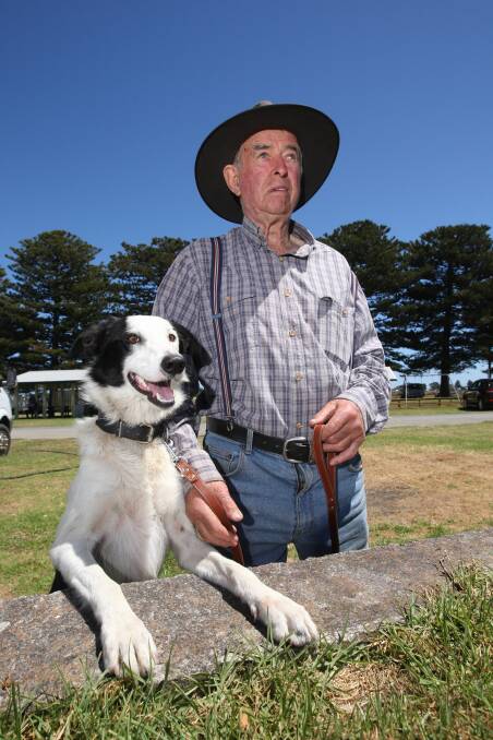 Laurie Slater and his border collie Stormey wait to compete.