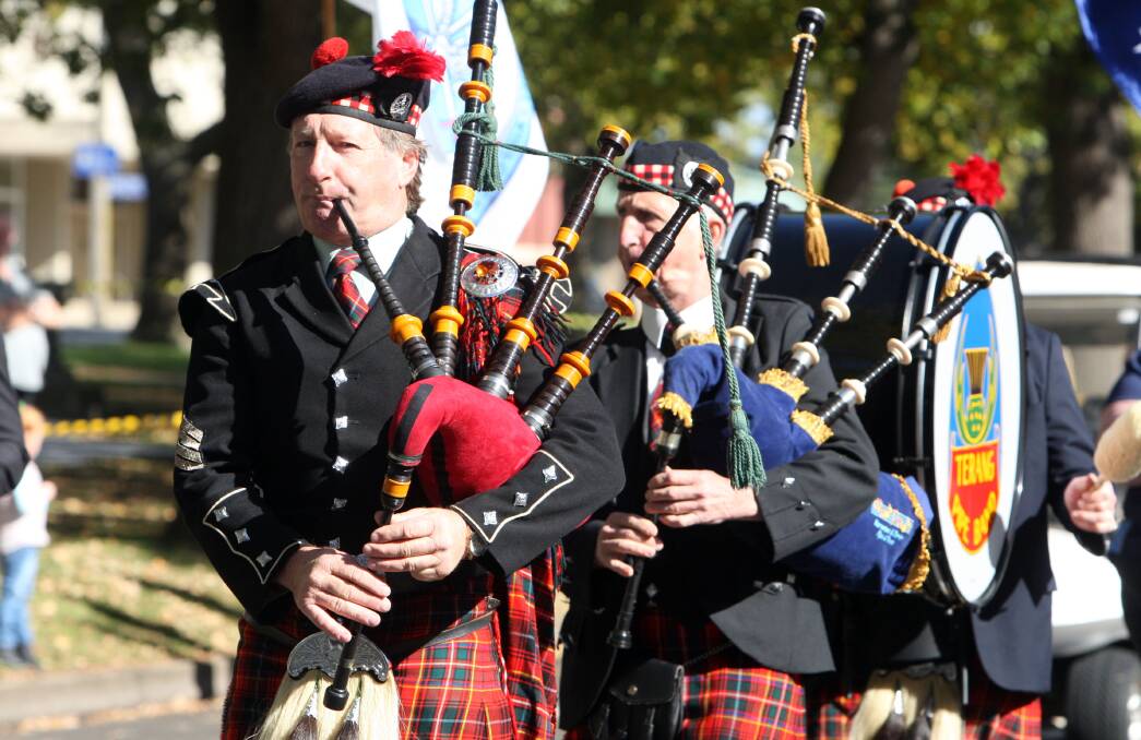 Terang Pipe Band’s John Pickford leads the pipers at last year’s Anzac Day service.