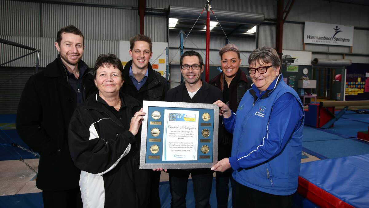 Springers gymnastic club members Brenda Jarry (front left) and Pam Davis display their certification, with approval from South West Sport’s Andrew Sloane, Matt Cameron and Stefan Grun from VicHealth and Marli Blackney-Noter from South West Sports. 