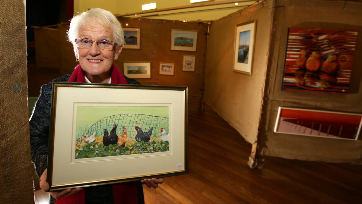 Cobden artist Wilma Fagan with her watercolor Strawberry Thieves, which will be on display at the Koroit Lions Club Art Show this weekend.