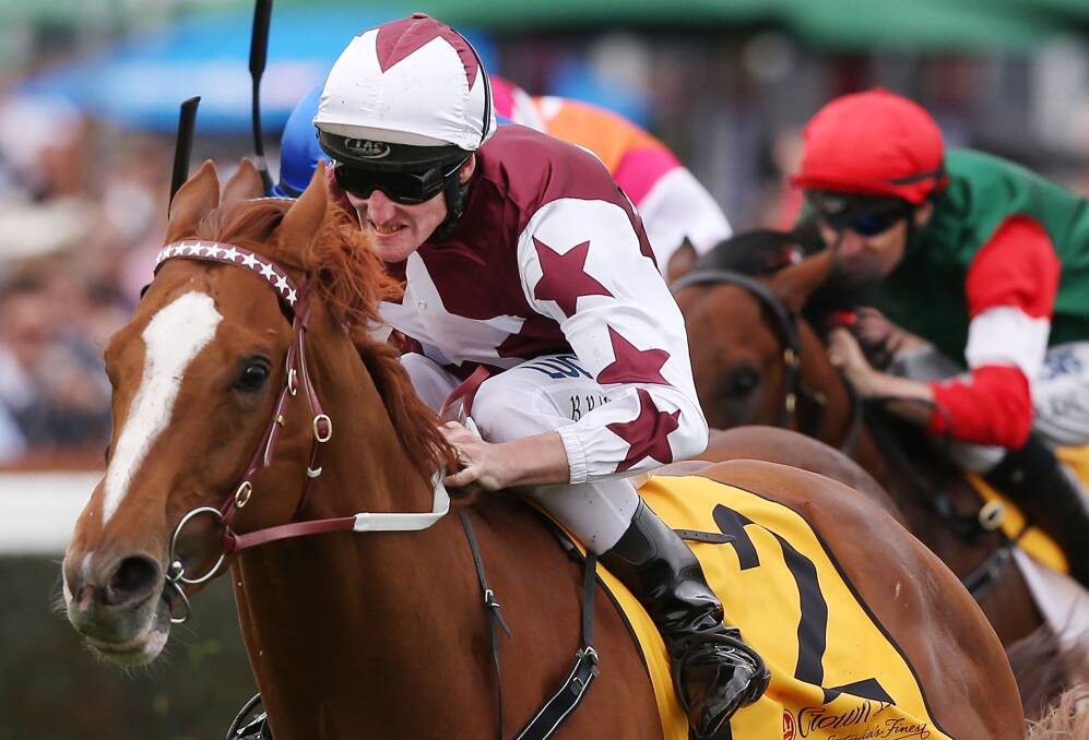 Brad Rawiller pilots home Darren Weir’s Warrnambool-trained Stratum Star in the $120,000 Crown Lager Stakes at Caulfield Cup day on Saturday.Picture: Getty Images