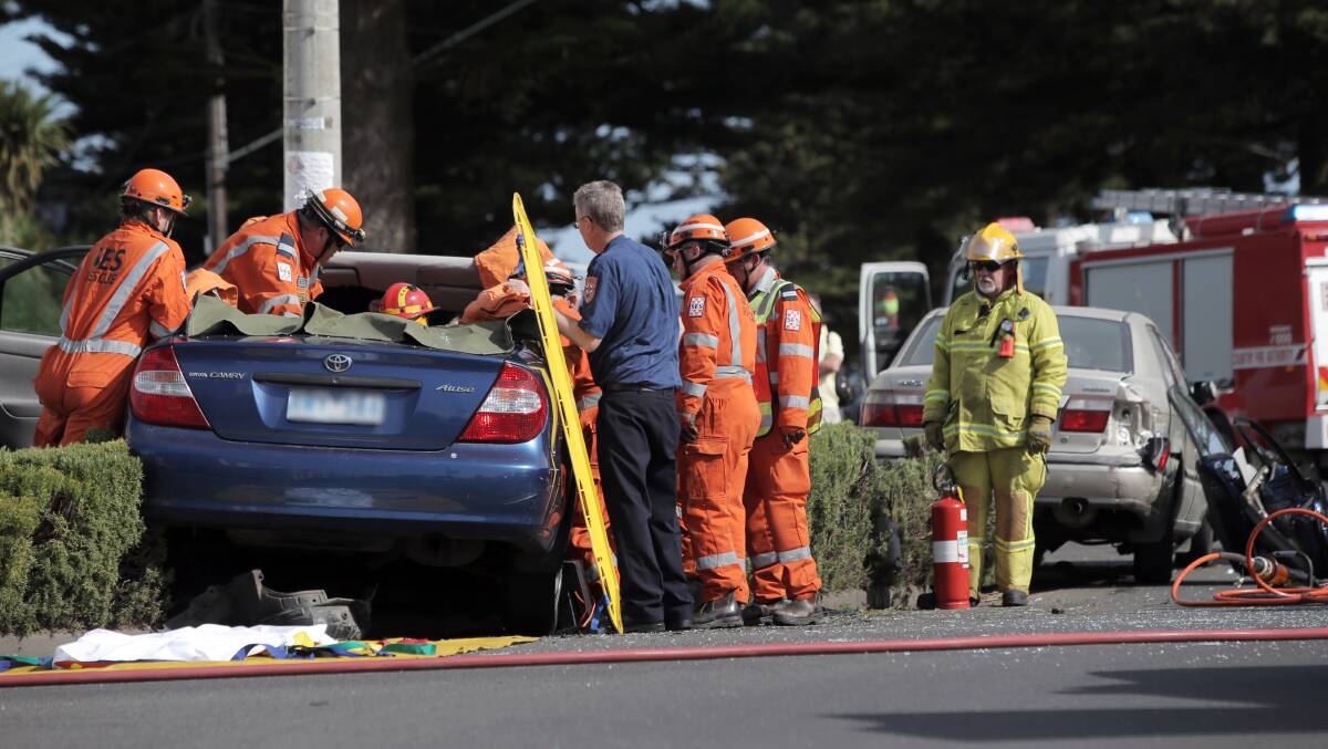 Emergency services workers cut Rachel Kelly from her car in Port Fairy after the smash in March.