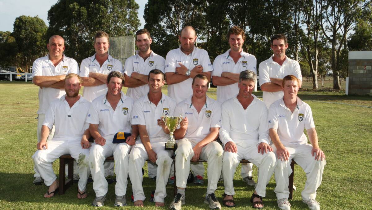 Panmure’s triumphant A grade side poses proudly with their latest premiership cup. 