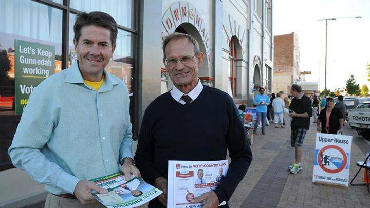 Nationals MP for Tamworth Kevin Anderson and Country Labor Candidate Joe Hillard up bright and early in Gunnedah. Photo: Marie Lowe