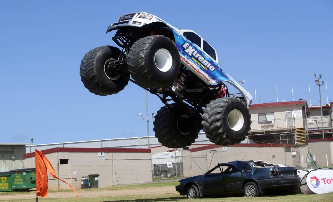 A monster truck flies through the air during practice before a show at Premier Speedway tomorrow night. Picture: DAMIAN WHITE