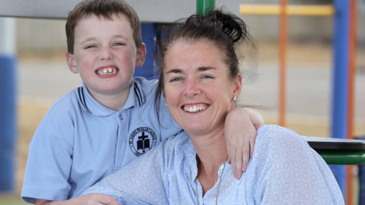 Bailey Kermeen, 7, with mum Leah Kermeen. Bailey was diagnosed with Aspbergers Syndrome at age 3. Picture: ROB GUNSTONE