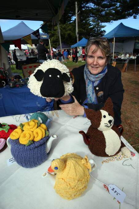 Becky Morton from Hamilton selling tea cosy's and cushions that she made have made . 