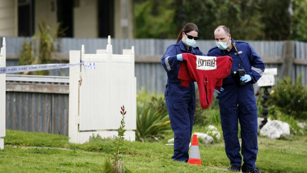 Police investigate the scene of double stabbing murder in Casterton in 2001. Aaron Jamie Ball has been sentenced to 20 years jail in the Warrnambool Supreme Court. 