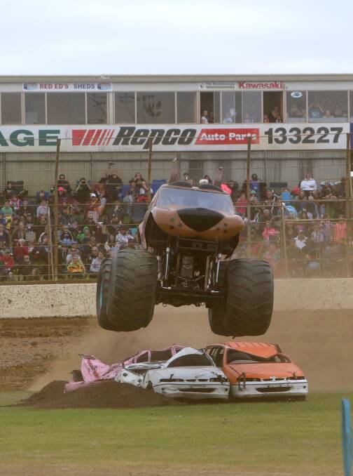 Monster trucks perform at Premier Speedway on Saturday night. Pictures: AARON SAWALL