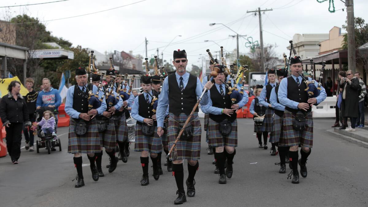 Warrnambool and District Pipes and Drums during the street procession. Picture: VICKY HUGHSON