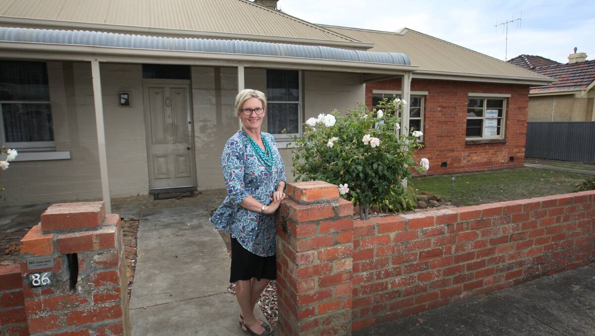 Kerry Nelson pictured in front of the house that has been bought for a Respite & Therapy Centre. 150401LP27 Picture:LEANNE PICKETT
