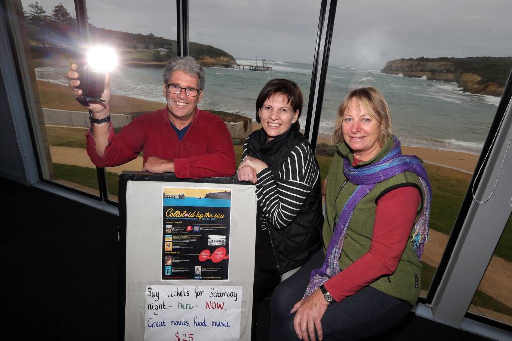 Port Campbell community film festival committee members Jon McLeod (left), Rebecca McAuliffe and Marg O’Toole shine a light on a weekend of entertainment. 150522DW04 Picture: DAMIAN WHITE