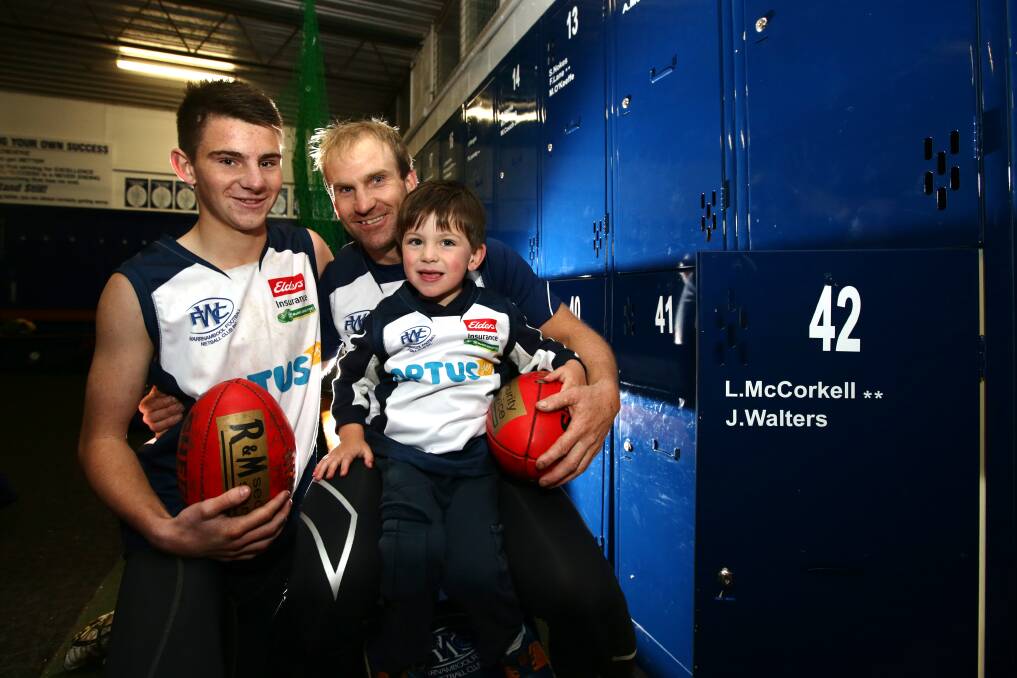 Warrnambool footballer Josh Walters has family support for his impending 200th appearance with the Blues from sons Jordan, 15 (left), and Lachlan, 3. 
