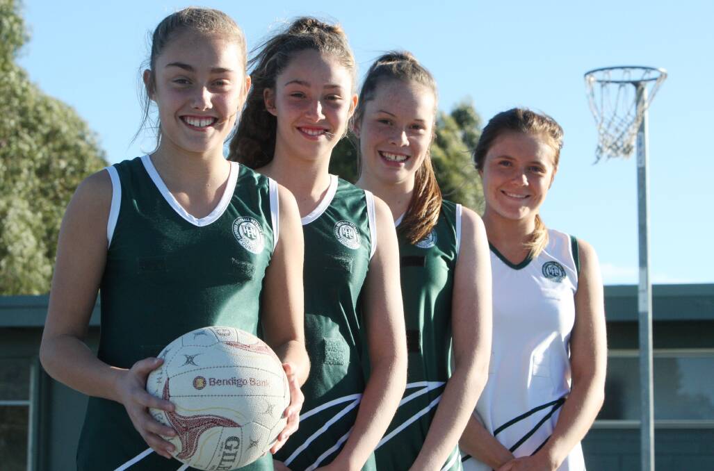 Have netball, will travel: Hampden league representatives Zoe Bussell (left), 13 and under, Kira Bussell, 15 and under, Sophie Chow, 17 and under, and Teagan Lang, open, will compete tomorrow in Melbourne. 