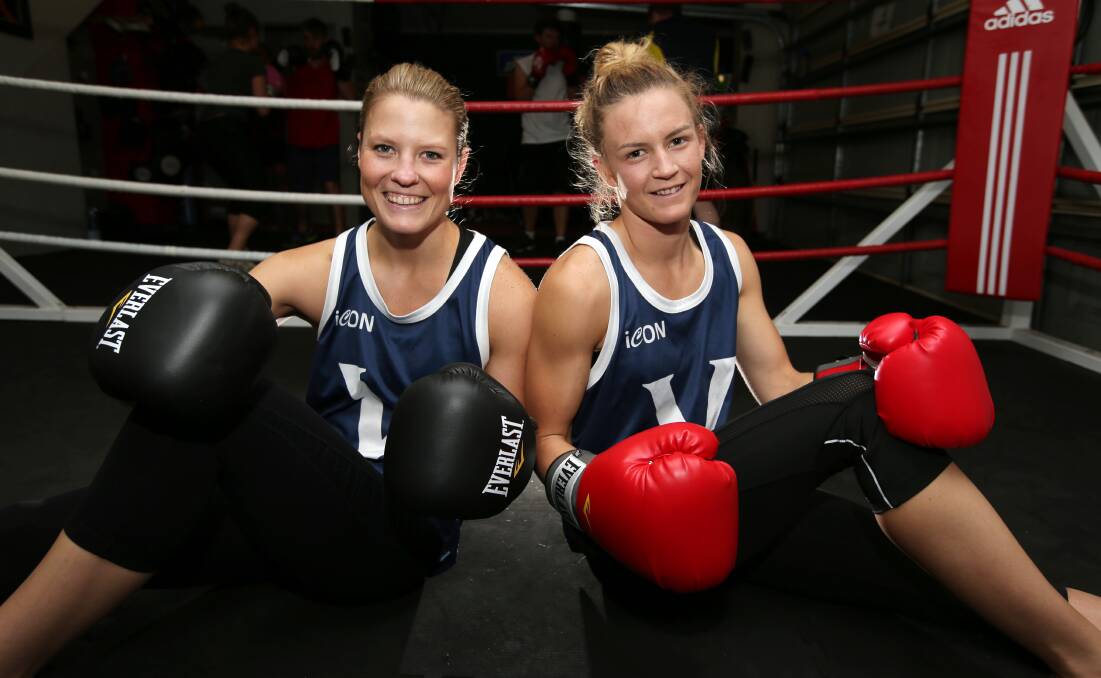 Warrnambool boxers and Victorian teammates Bianca Slater (left) and Luci Hand have returned with silver medals from the national boxing championships 