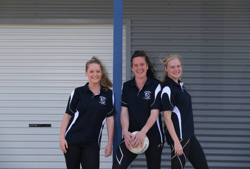 New Nirranda netball coach Anna Murnane (centre) is flanked by recruits Lisa (left) and Jo Couch, who have crossed from Terang Mortlake. 141211VH03 Picture: VICKY HUGHSON