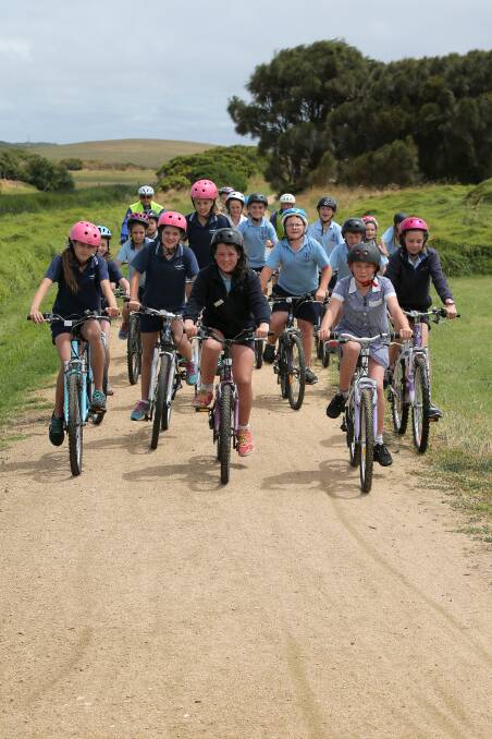 Pupils from Merrivale Primary School, St Pius X Primary School and St Josephs Primary School enjoy the Bluelight bike ride along the Warrnambool to Port Fairy Rail Trail. 141126RG05 Picture: ROB GUNSTONE