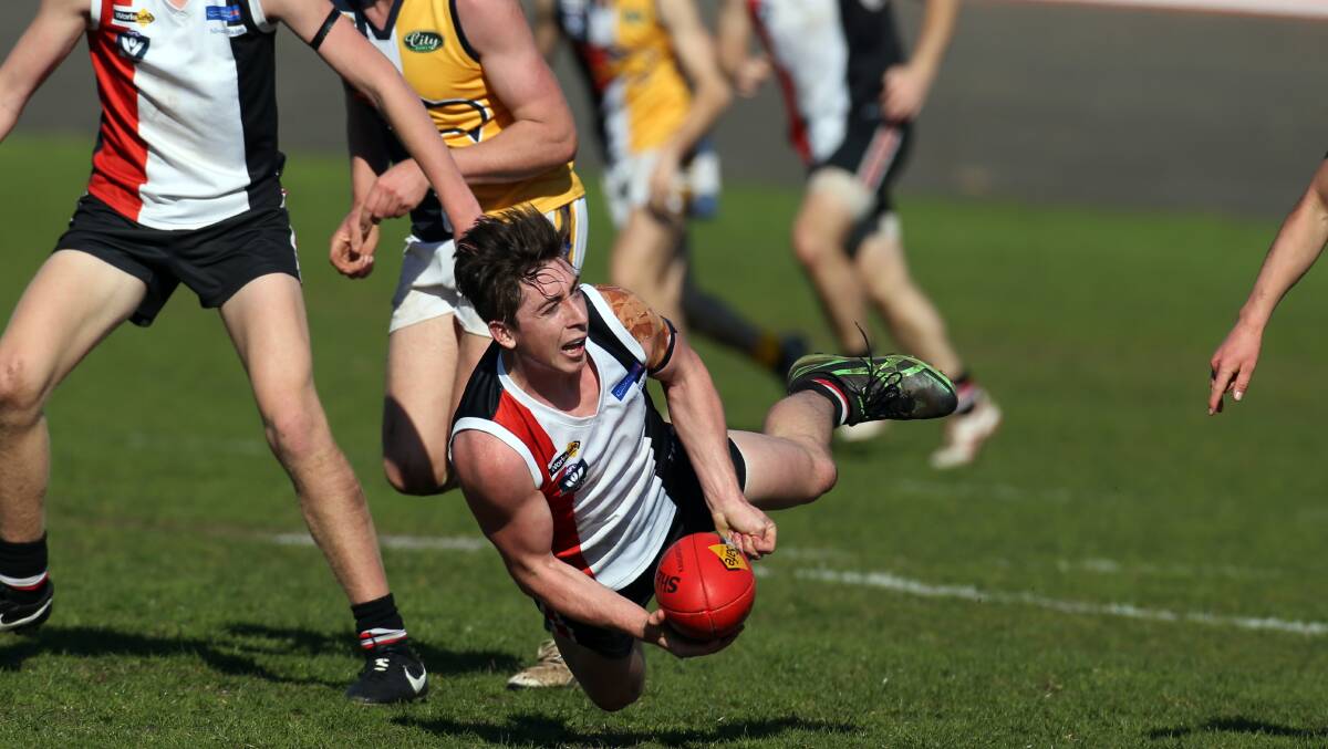 Taylor Mulraney in action in the Saint’s’ qualifying final win on Saturday.140830DW31 Picture: DAMIAN WHITE
