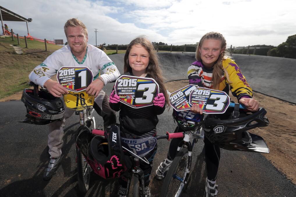 Mic Williams (left) Annie Jephcott and Nikita McKinnon returned home from the South Australiam BMX titles with top results. Picture: ROB GUNSTONE