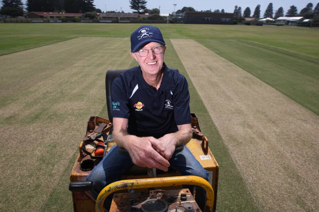 Port Fairy Cricket Club curator Bob Dwyer prepares the Avery’s Paddock pitch for today’s VPC match. 141024AS02 Picture: AARON SAWALL