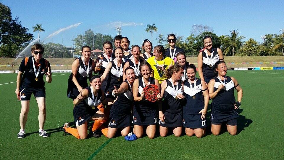The Victorian over 40s hockey side celebrate winning its age division at the 2014 Australian Masters’ Hockey Championships in Darwin. Warrnambool representatives Kyme Rowe, Anna Dyson and Therese Burke were part of the side.