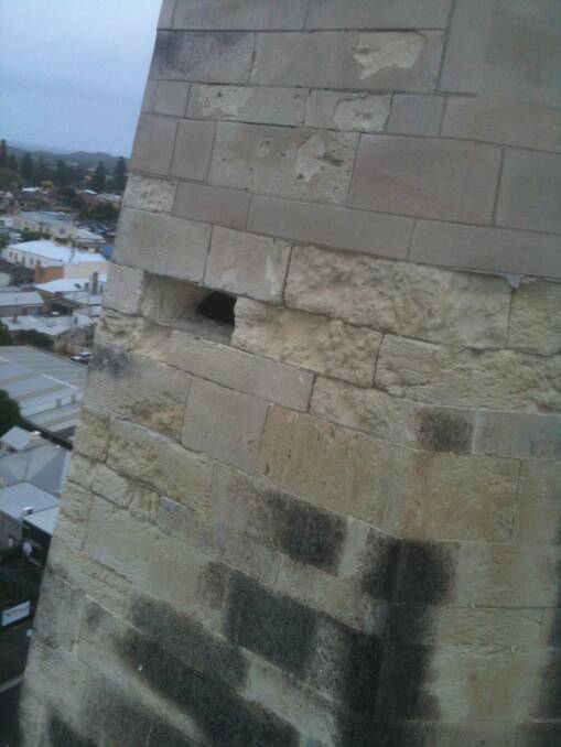 Damage to the sandstone spire atop St Joseph’s Church, caused by cockatoos. 