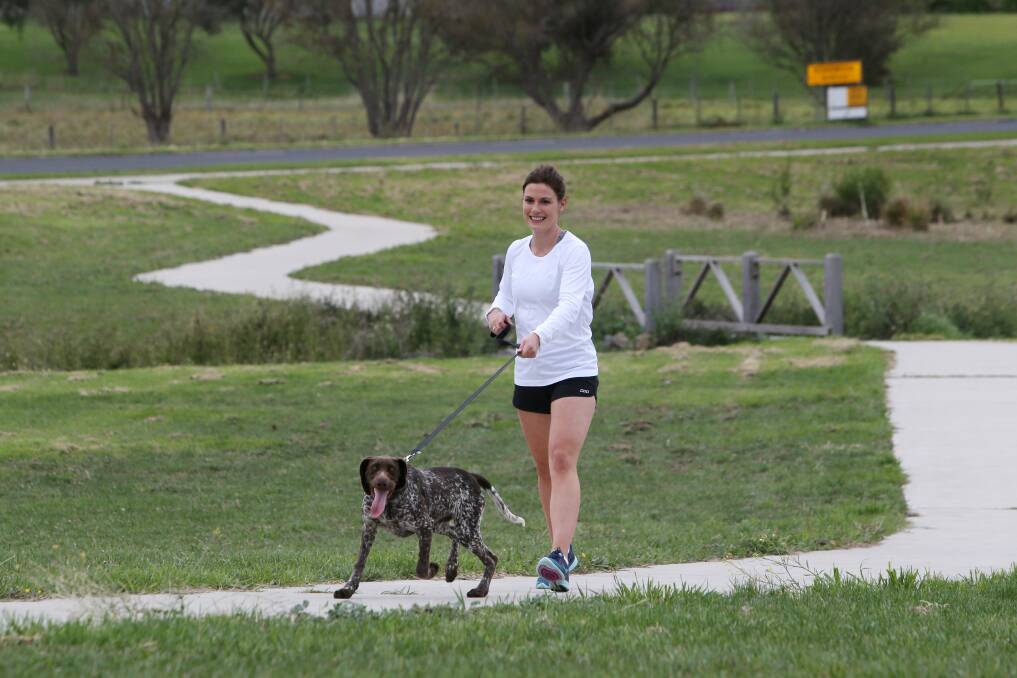 Anna Buzolich wants more lighting around a popular walking track in the St James Park area so she can feel safer walking her dog Indy at night.150401AS33 Picture: AARON SAWALL